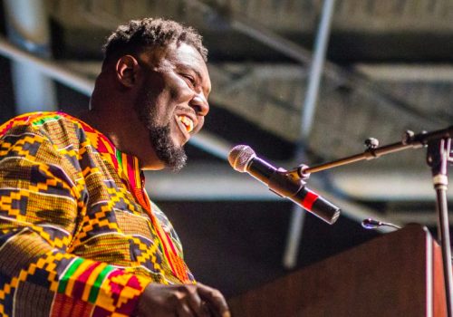 Agya Boakye-Boaten speaking at a podium